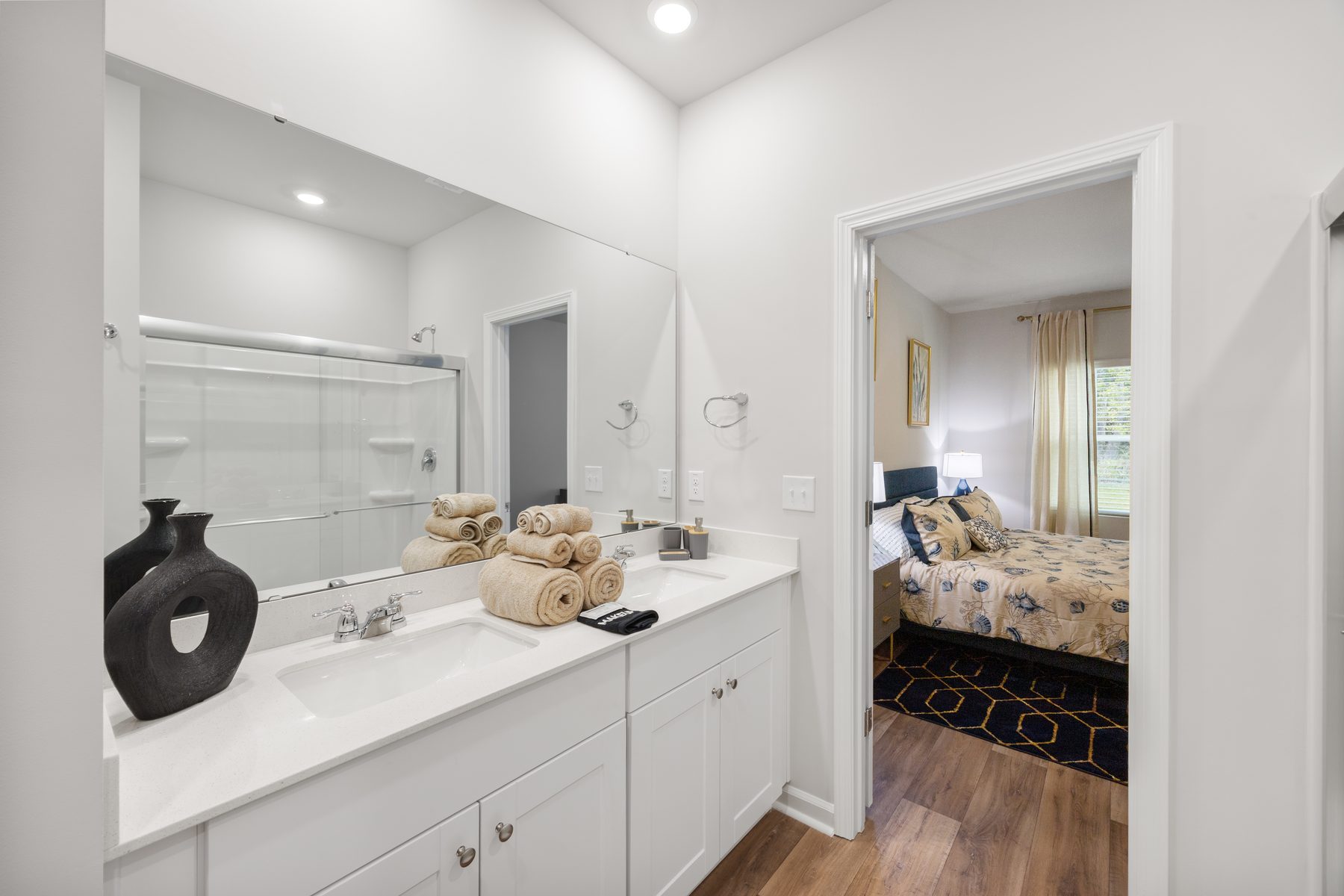 Primary bath opening to the bedroom